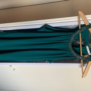 Dark green sleeveless blouse